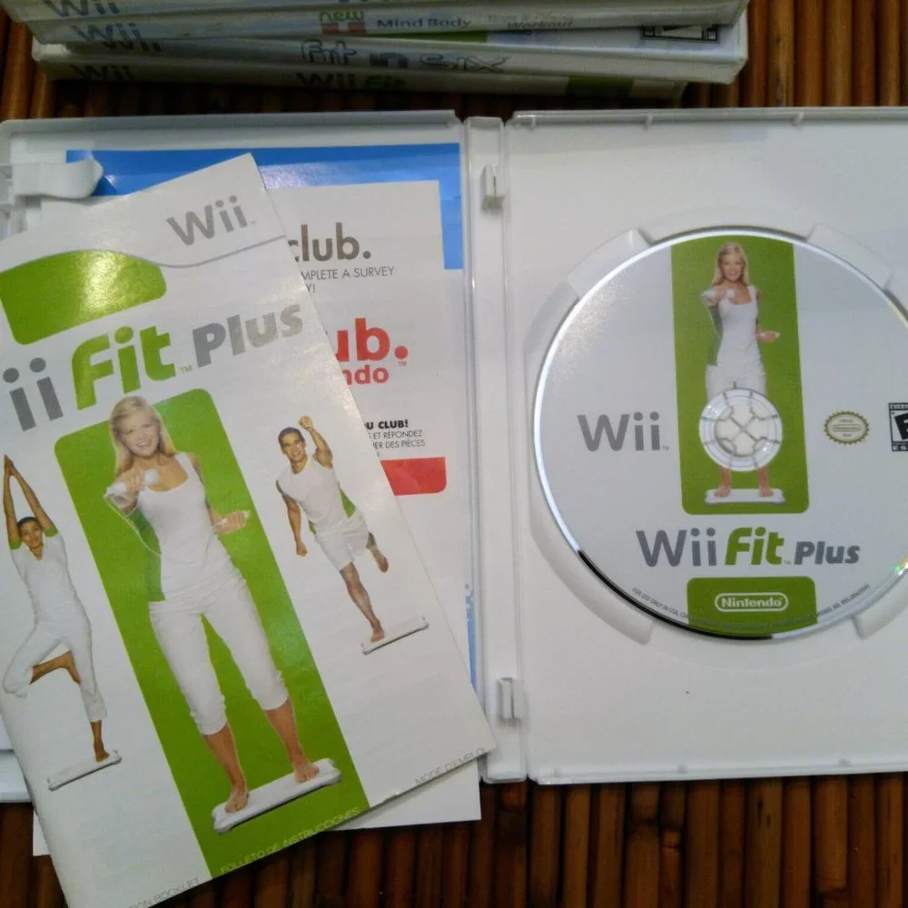 Nintendo Wii Fit Plus Fitness Game with Manual